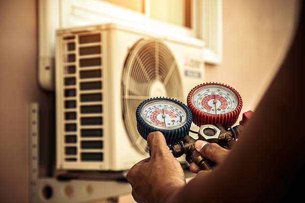 Professional Ac Installation technician working in Bat Cave, NC